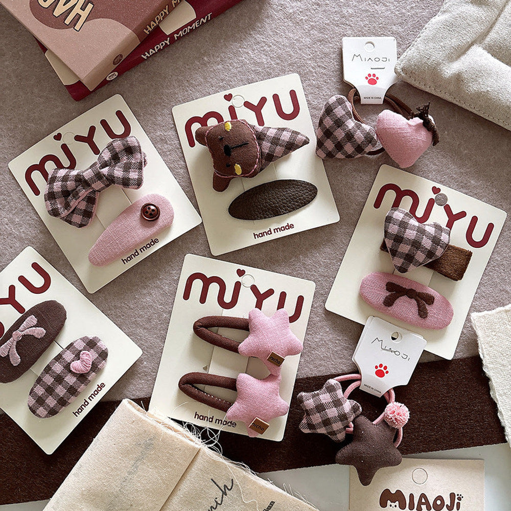 MyKids-USA® Collection of 2 Geometric Shaped Hair Clips and Hair Ties