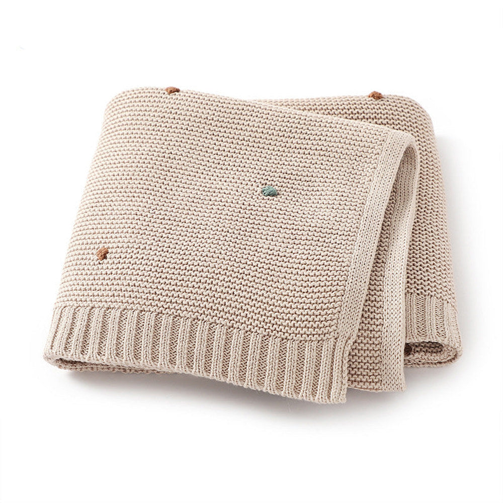 Knitted Solid Color Baby Blanket With Hand-Embroidered Pom Poms
