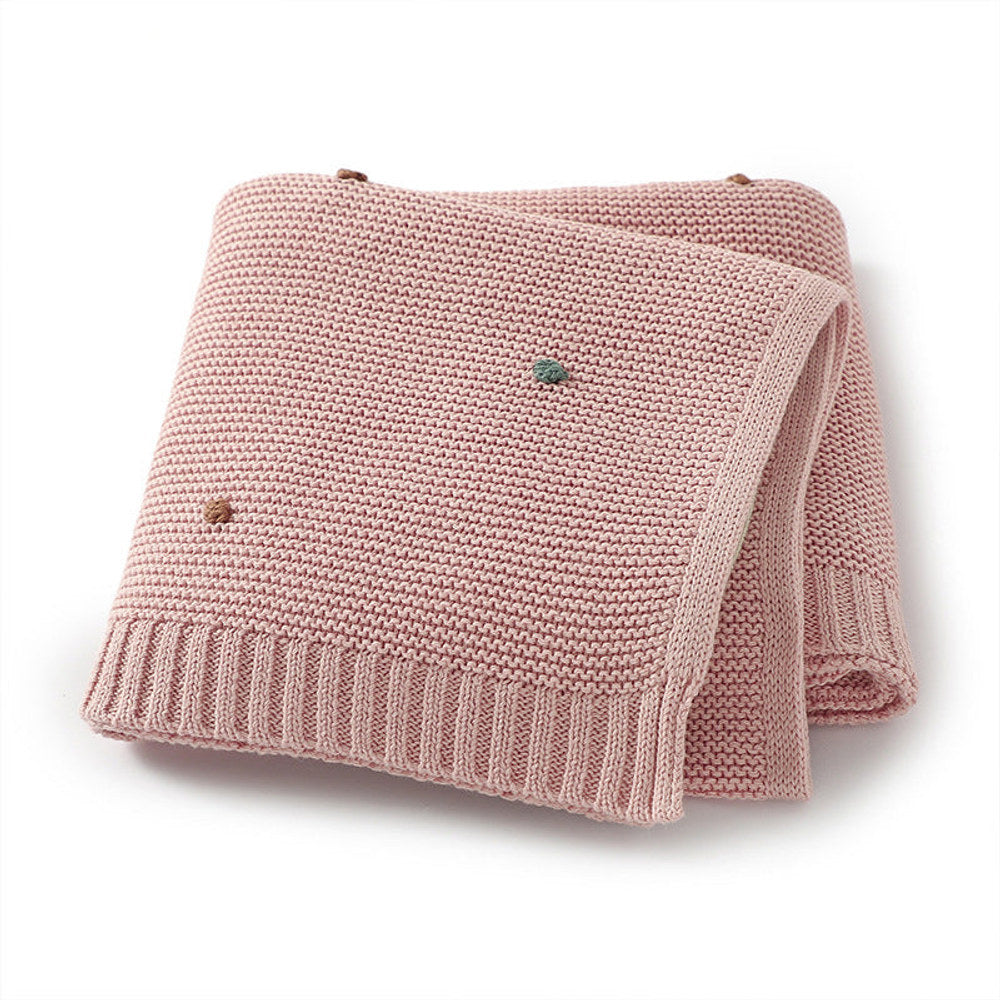 Knitted Solid Color Baby Blanket With Hand-Embroidered Pom Poms