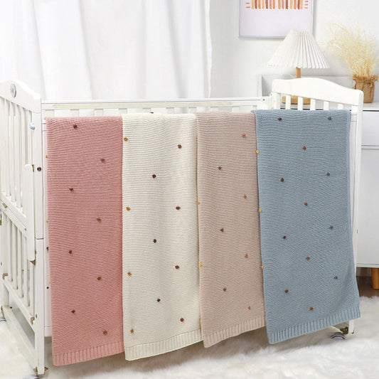 MyKids-USA® Knitted Solid Color Baby Blanket With Hand-Embroidered Pom Poms