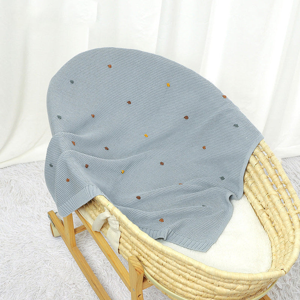 Knitted Solid Color Baby Blanket With Hand-Embroidered Pom Poms