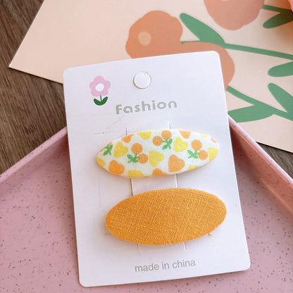 MyKids-USA® Of 2 Candy-Colored Oval Cloth Hair Clips