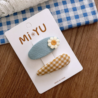 MyKids-USA® Collection of 2 Versatile Flowers and Cartoon Pattern Hair Clips