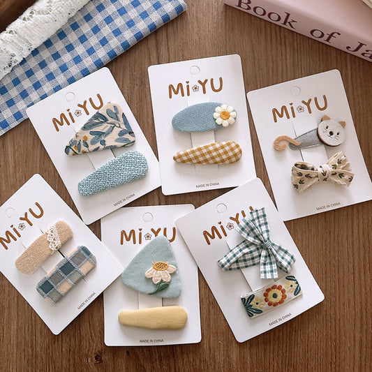 MyKids-USA® Collection of 2 Versatile Flowers and Cartoon Pattern Hair Clips