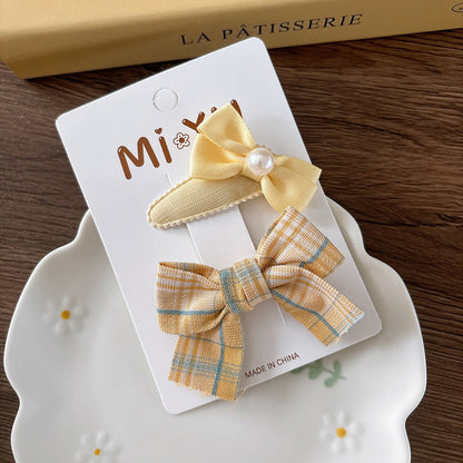 MyKids-USA® Collection of 2 Versatile Flowers and Plaid Pattern Hair Clips