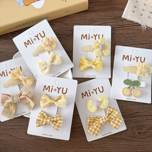 MyKids-USA® Collection of 2 Versatile Flowers and Plaid Pattern Hair Clips