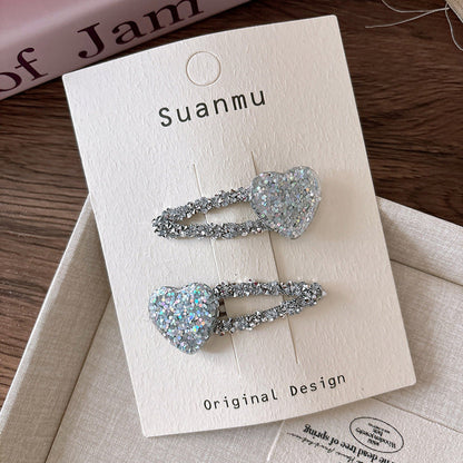 MyKids-USA® Collection of 2 Versatile Sparkling Silver Star Hair Clips and Hair Ties