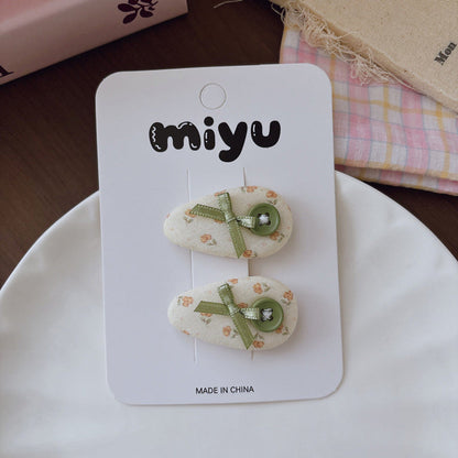 MyKids-USA® Collection of 2 Cute Geometric or Flowers Pattern Hair Clips