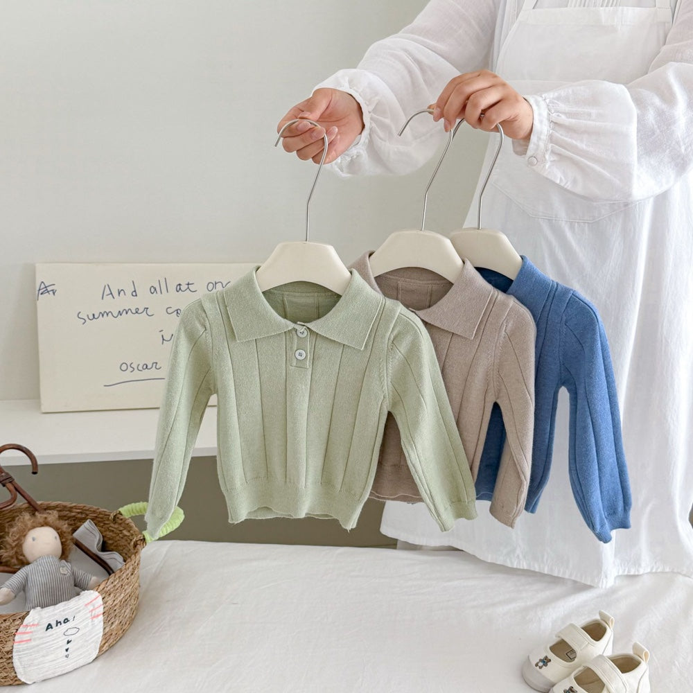 MyKids-USA ribbed knit baby polo shirt in green, apricot and blue on hangers