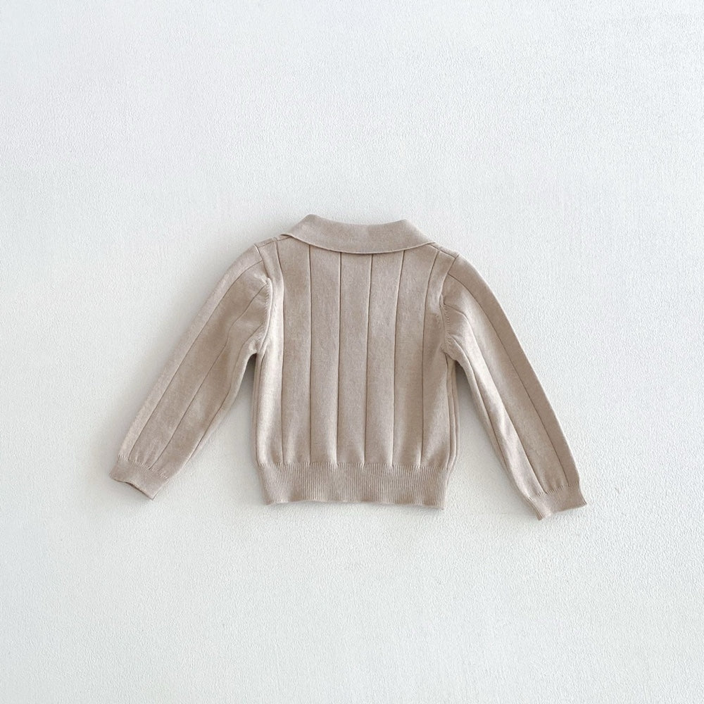 Baby polo shirt in apricot, back view
