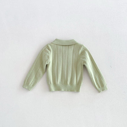 Baby polo shirt in green, back view