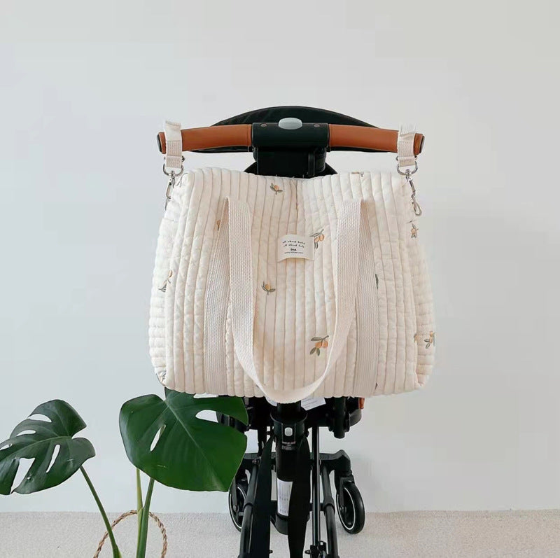 Bolso colgante de mamá de almacenamiento de color sólido con patrón bordado para bebé 