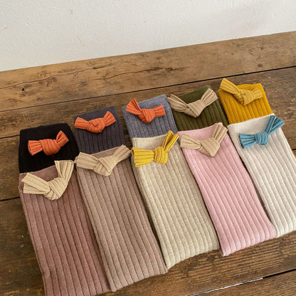 Chaussettes d'automne en tube moyen pour bébé fille avec nœud de couleur unie 
