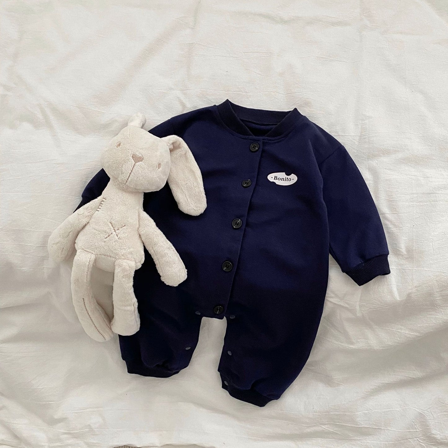 Mono de manga larga con diseño de un solo pecho en color liso para bebé 