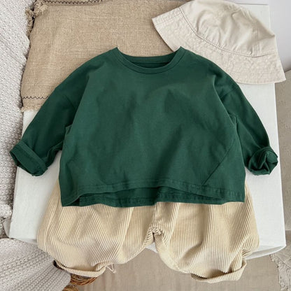 Camisa básica de algodón suave de manga larga con cuello redondo de color liso para bebé 